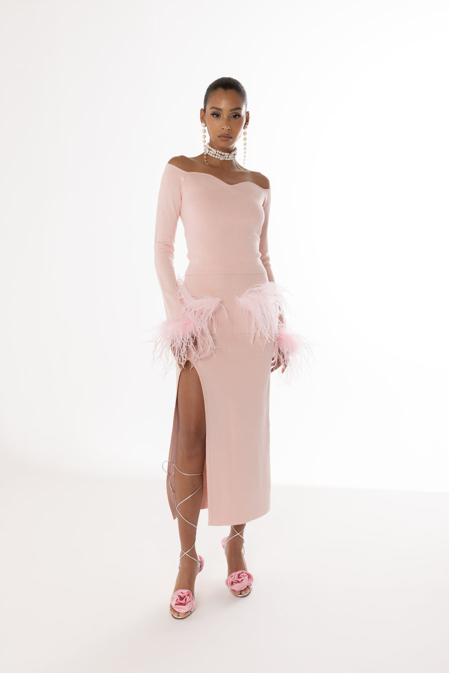 andreeva pink knit top with feathers