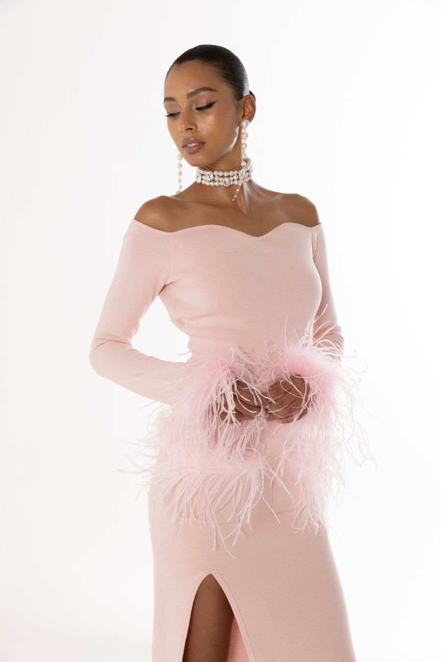 andreeva pink knit top with feathers