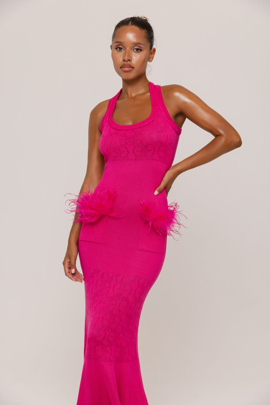 andreeva pink knit dress with feathers