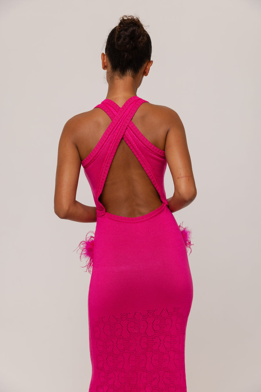 andreeva pink knit dress with feathers