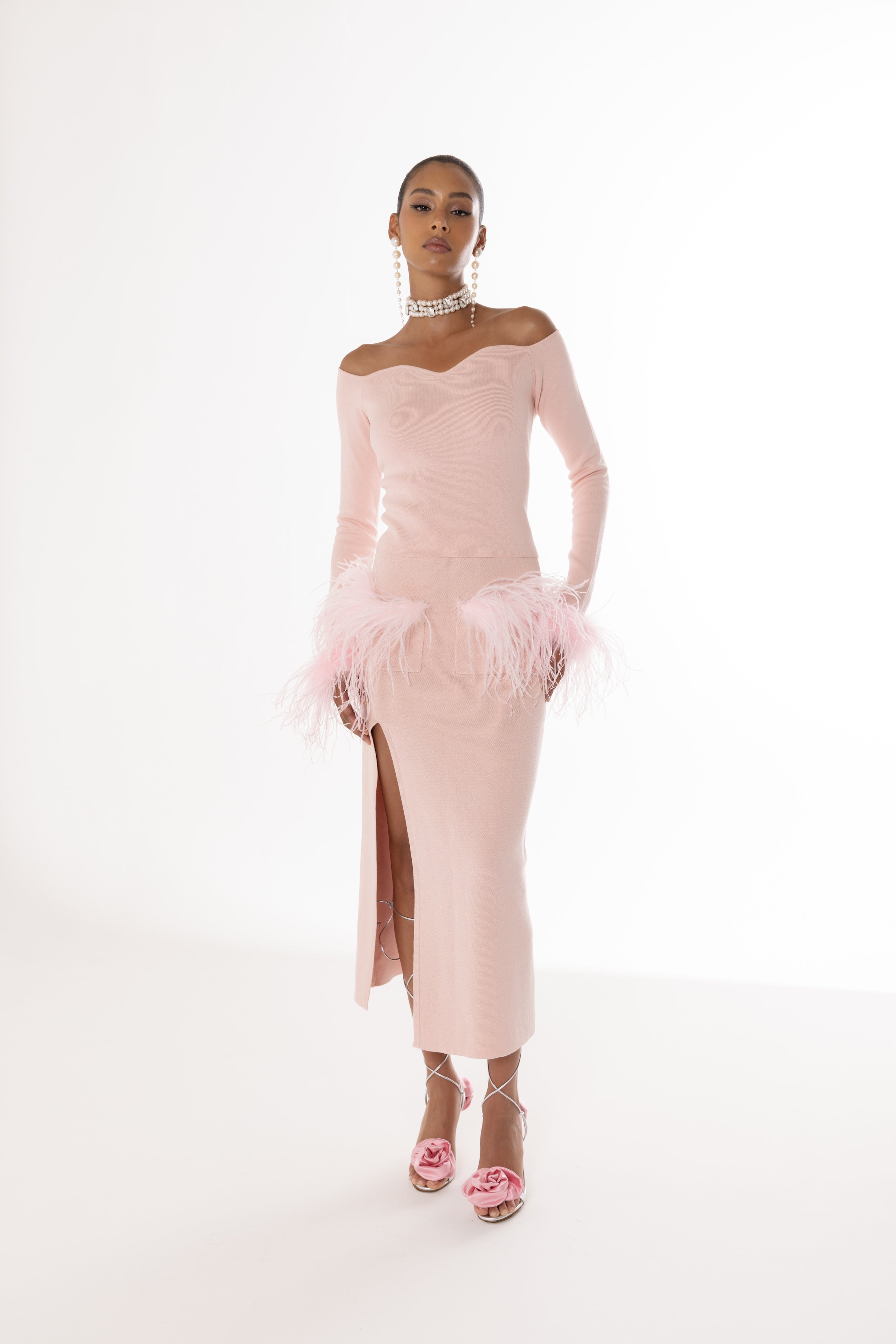 andreeva pink knit top with feathers