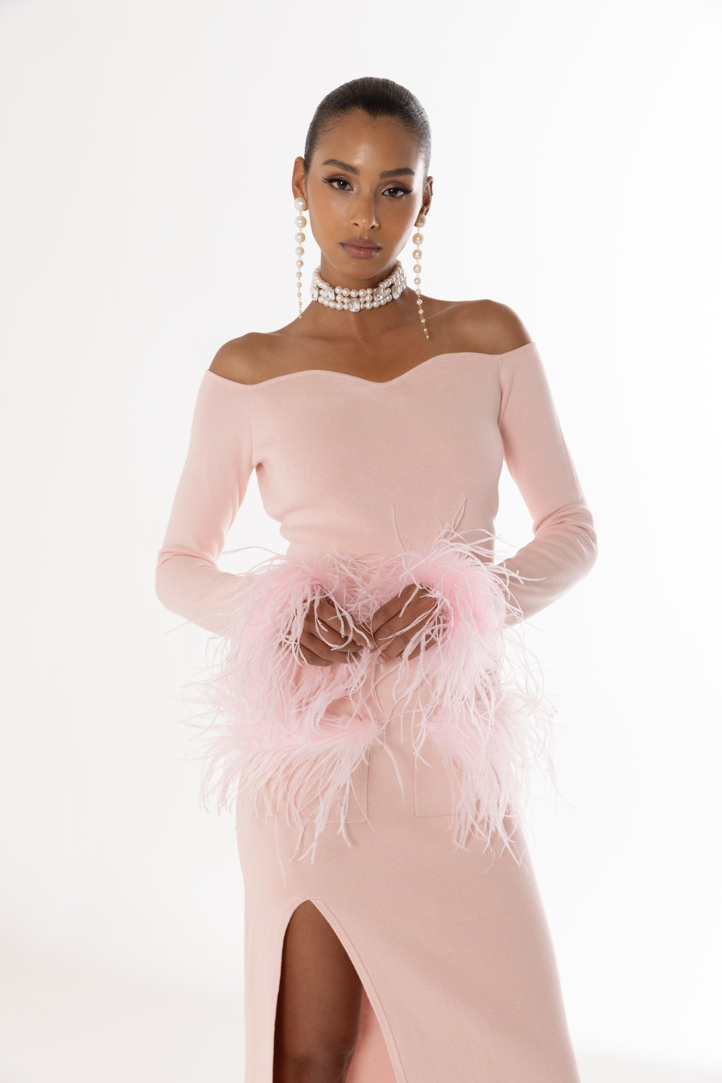 andreeva pink knit top with feathers