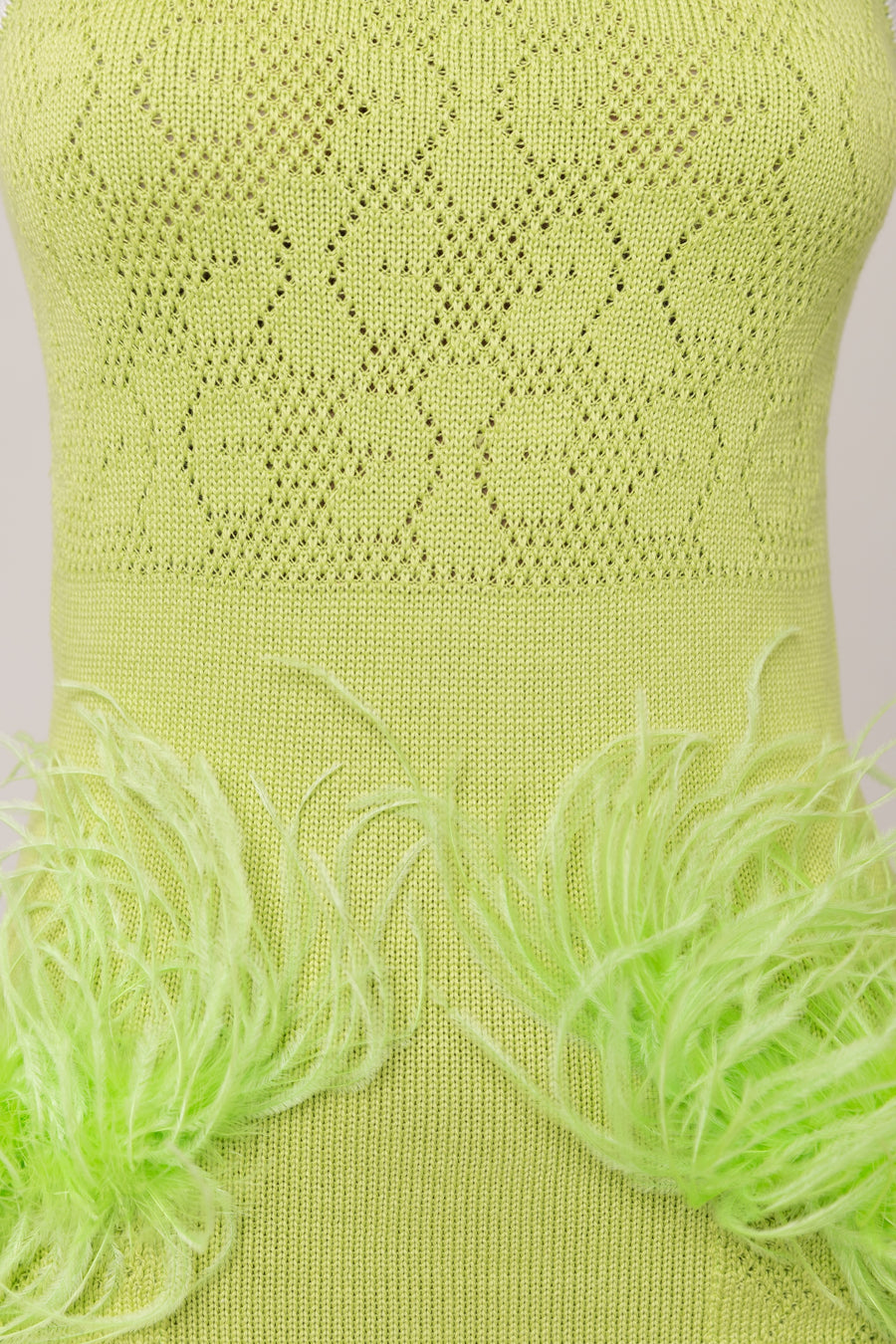 andreeva green knit dress with feathers