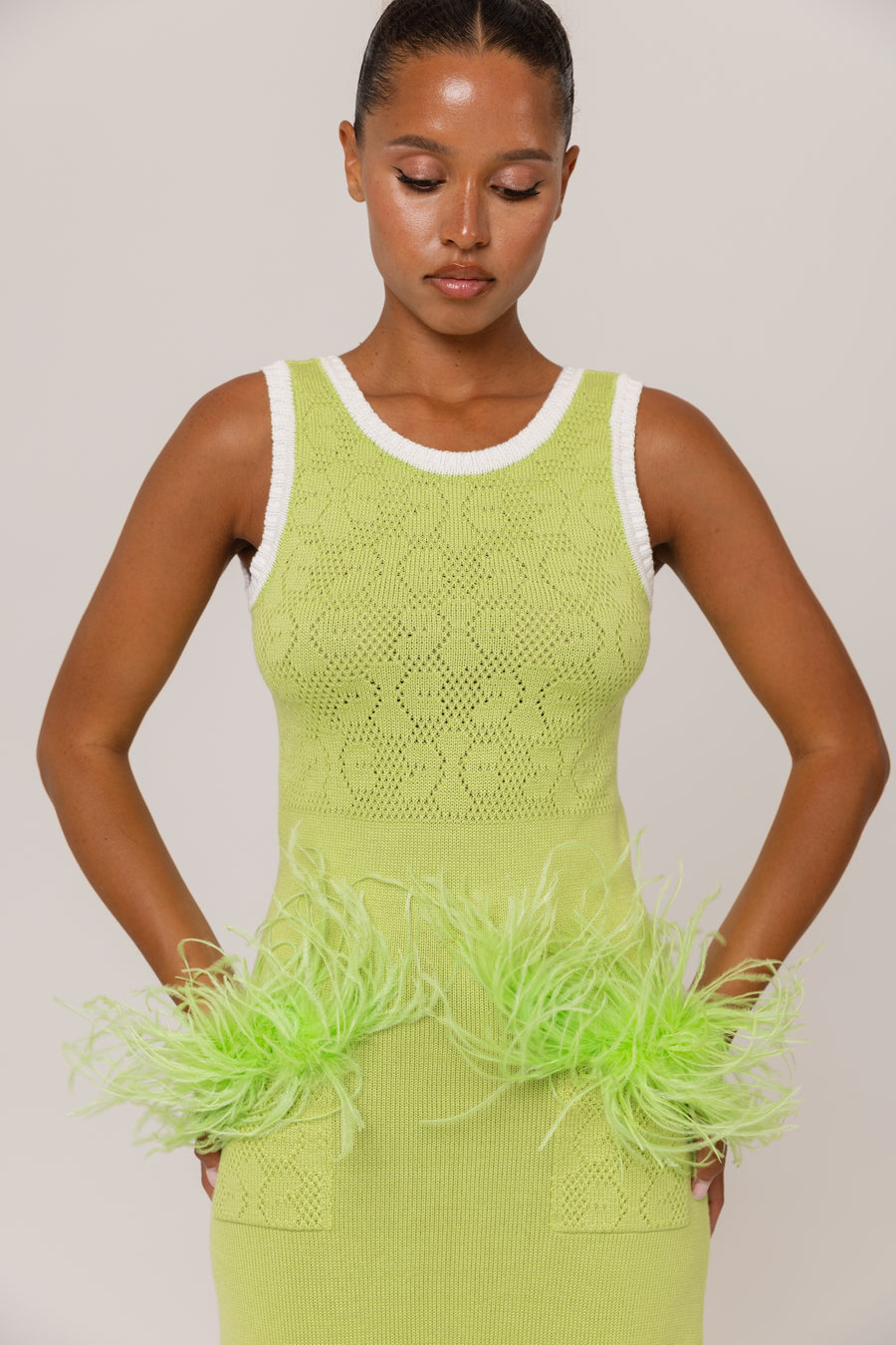 andreeva green knit dress with feathers