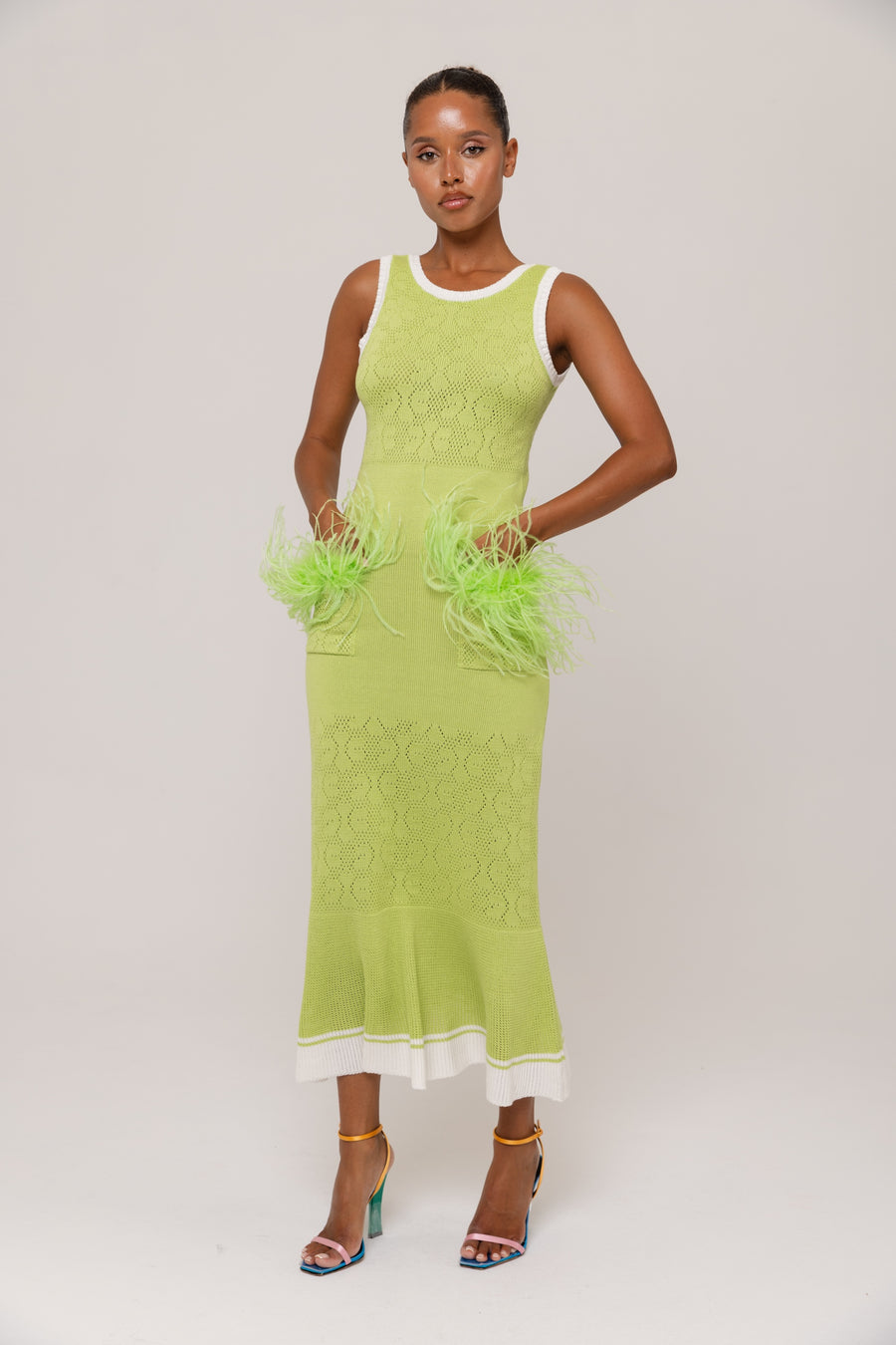 andreeva green knit dress with feathers