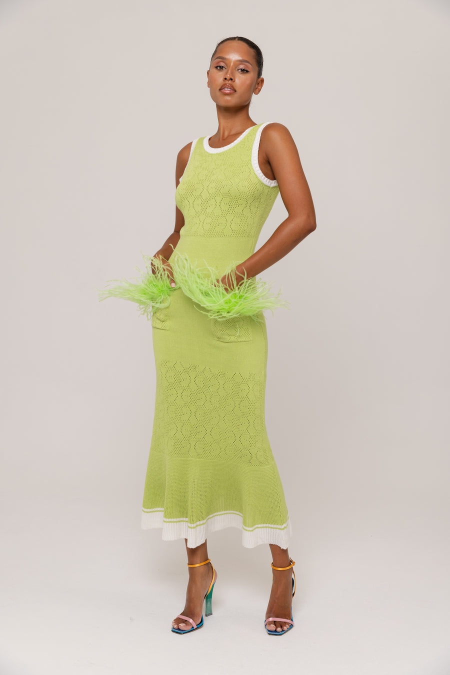 andreeva green knit dress with feathers