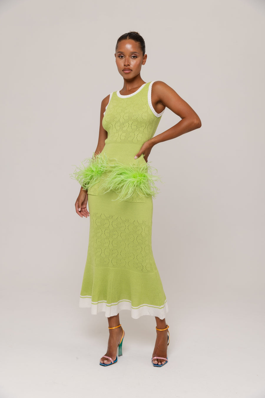 andreeva green knit dress with feathers