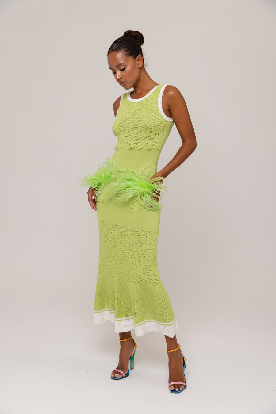 andreeva green knit dress with feathers