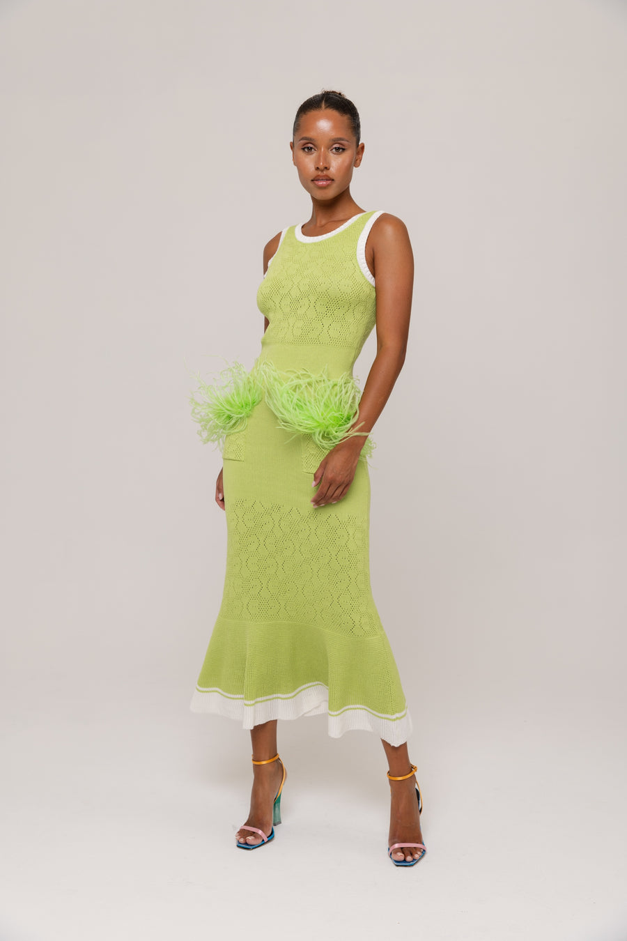 andreeva green knit dress with feathers