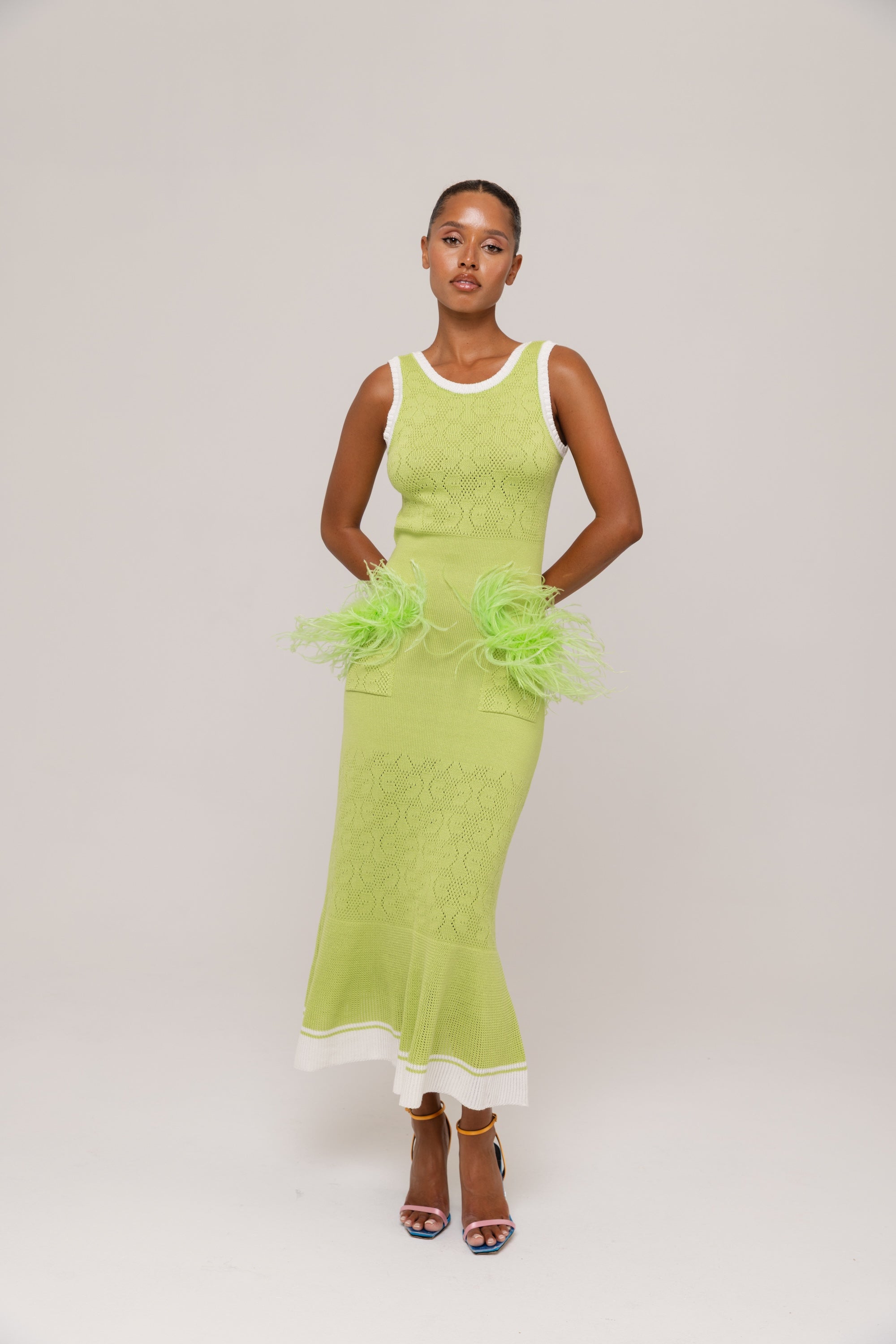 andreeva green knit dress with feathers