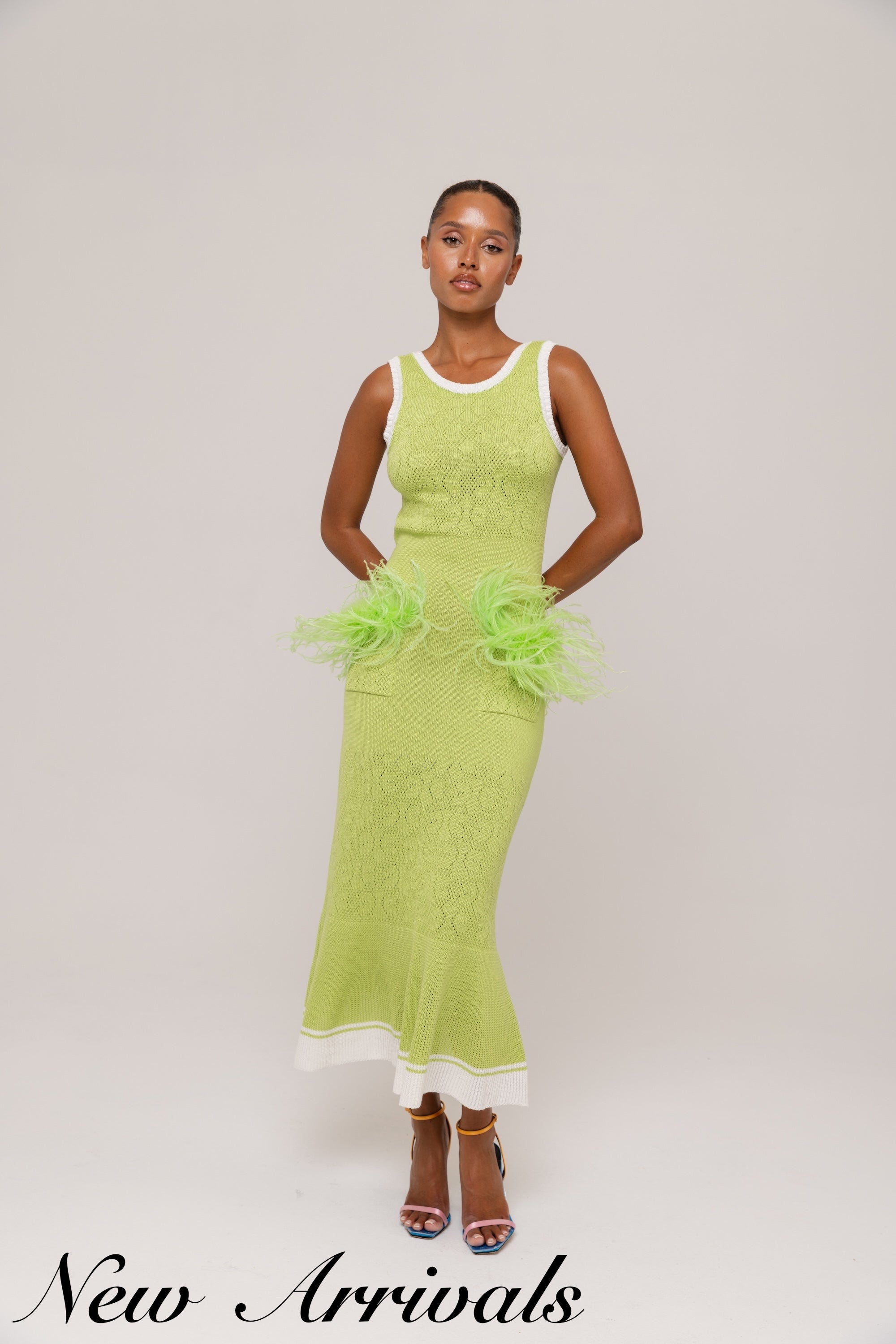 andreeva green knit dress with featehts
