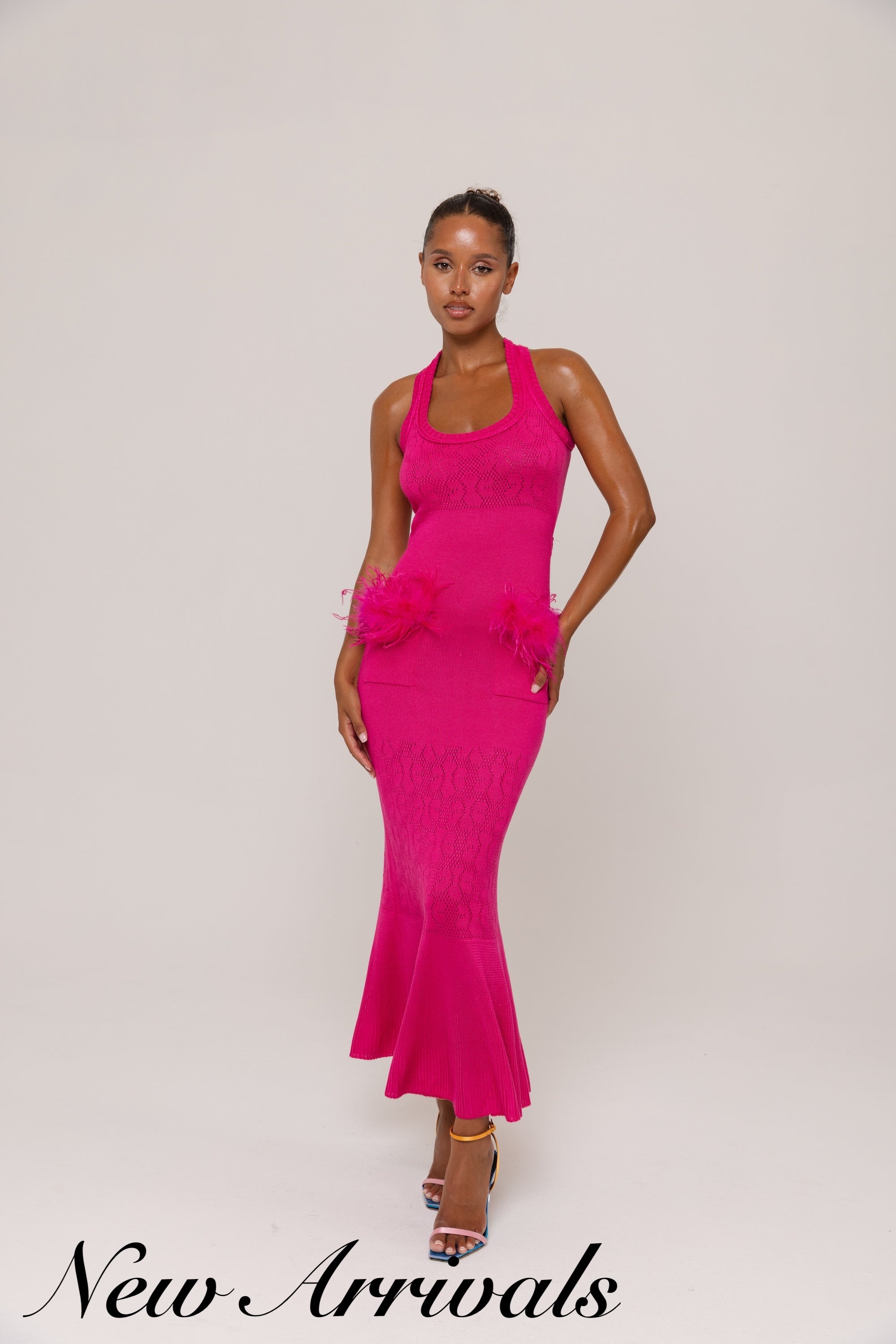 andreeva pink knit dress with feathers