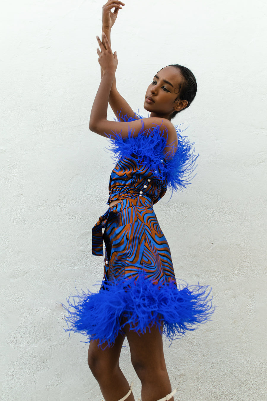 Blue skirt with ostrich feathers