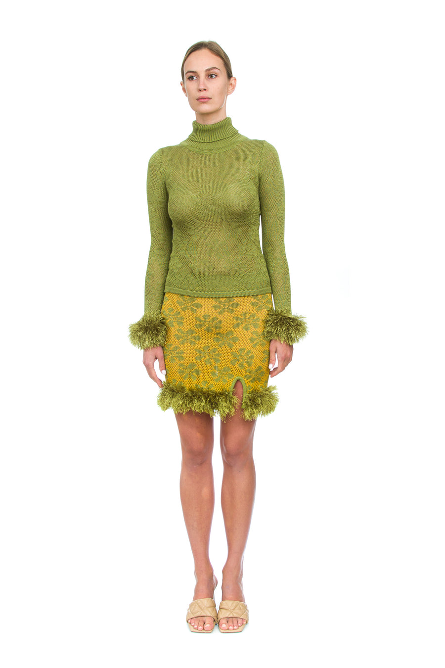 Green knit turtleneck with handmade knit details